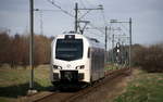 Ein Holländischer Regionalzug aus Roermond(NL) nach Maastricht-Randwyck(NL) und fährt in Geleen-Lutterade ein und hält in Geleen-Lutterade(NL) und fährt dann weiter in Richtung