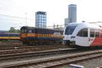 Geno im Morgensonne.

Ein ACTS Class 58 und ein Arriva GTW im Leeuwarden