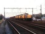 6471, 6417, 6460 und 6444 mit Erzzug 48117 Maasvlakte-Dillingen bei Lage Zwaluwe am 14-10-1996.