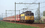 NS 1112 mit IC-4663 (Zwolle - Vlissingen) bei Elst am 15.04.1991, 17.31u.