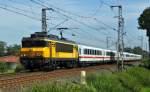 NS 1773 ist am 20.08.11 bei Gildehaus mit dem IC 146 Berlin Ostbahnhof - Schiphol Airport unterwegs.