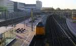 Ein Koploper der NS aus  Den-Haag-Centraal(NL) nach Venlo(NL) und fährt in Rotterdam-Centraal(NL) ein.