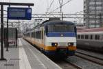 Einfahrt einer Sprinter Doppel Garnitur am 27.10.2014 in Amsterdam Centraal.