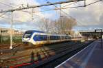 ET 2431 mit einem Regionalzug aus Rotterdam-Centraal(NL) nach Uitgeest(NL bei der Ausfahrt aus Rotterdam-Centraal(NL) bei schönem Sonnenschein und Wolken am Nachmittag vom 4.1.2015.