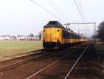 Koplopers 4077 + 4094 mit Eilzug 3647 Zwolle-Roosendaal bei Dieren am 12-3-1999.