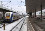 nord-ostsee-bahn-nob NOB 80515 aus Westerland/Sylt erreicht am 3.01.10 den Bahnhof Hamburg-Altona auf Gleis 8. Dieser Zug wird aus einem Werbewagenpark gefahren, der f�r die Strecke Warnem�nde - Leipzig wirbt.