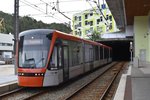 BERGEN (Provinz Hordaland), 10.09.2016, Wagen 218 als Linie 1 der bybanen (Stadtbahn) nach Byparken in der Haltestelle Fantoft