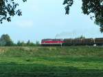 2043 034-4 hat mchtig mit einem Gterzug zu kmpfen (Ausfahrt Bhf. RIED i.I. 2006-09-29)