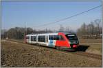 5022.048 fhrt als erster Zug nach einer Woche langem Schienenersatzverkehr aufgrund von Triebwagenmangel auf der Radkersburger Bahn als R 4149 von Spiefeld nach Bad Radkersburg. Halbenrain, 23.01.2011