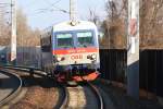 5047 041-8 am 26.Februar 2012 als R 2563 von Raasdorf nach Wien Sdbahnhof(Ost) kurz vor der Hst. Lobau.