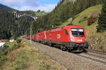 ÖBB 1016 008-5, 1016 030-9 & 1293 033-7 mit einem schweren Eisenschrottzug nach Italien bei der Bergfahrt auf den Brennerpass. Aufgenommen bei St. Jodok am Brenner am 09.10.2021