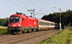 1016 040 mit EC 112 Klagenfurt-Frankfurt am 25.09.2021 an der ehemaligen Blockstelle Gurgelhau zwischen Beimerstetten und Westerstetten.