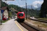 1016-005 betritt mit Eurocity Imst-Pitztal. Rechts im Hintergrund der Acherkogel. 24. Mai 2009 kHds