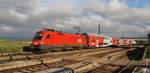 Bei schönem Herbstwetter am 17.11.2014 ist die 1016 002-8 mit dem R-Zug nach St.