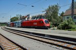 1116 028-2 schiebt den City Shuttel  Wiesel  am 25.05.16 in Richtung Bludenz gesehen in Lindau/Bodensee.