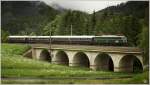 ber das 82m lange Holzergraben Viadukt fhrt 1041.15 mit Sdz R14551 von Wien FJbf nach Mrzzuschlag.
Spital am Semmering 28.5.2011



