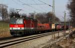 BB 1144 201 + 1144 224 vor Gterzug Richtung Rosenheim, KBS 951 Mnchen - Rosenheim - Salzburg, fotografiert bei Vogl zwischen Aling und Grokarolinenfeld am 25.02.2011