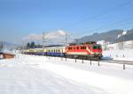 1110 522 mit einem Sonderzug fr das Hahnenkamm-Rennen in Kitzbhel am 26.01.2013 bei Fieberbrunn. Hier wurde der Zug bei der Leerfahrt von Kitzbhel nach Saalfelden abgelichtet.