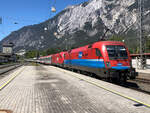 1116 045  Rail Cargo Hungaria  & 1016 032 mit dem EC 163  Transalpin  bei der Einfahrt in Ötztal-Bahnhof. Ab Innsbruck Hbf zog 1016 032 den Zug alleine weiter bis Selzthal. Aufgenommen am 31.05.2021