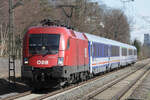 ÖBB 1116 252 erreicht mit dem über Passau umgeleiteten EN 407 Warschau - München den Norden von München, München Fasanerie, 11.03.2024