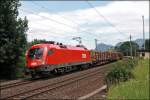 1116 169 ist mit einem Holzzug auf dem Weg Richtung Hall i.Tirol oder Arlberg. Aufgenommen am 05.07.2008 in Mnster-Wiesing.
