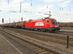 ITL 1116 235-1 mit einem Kesselwagenzug in Magdeburg-Rothensee. Kurz zuvor wurde sie von der Magdeburger Hafenbahn aus dem nicht elektrifizierten Bereich des Gterbahnhofs rangiert. Fotografiert am 07.08.2009