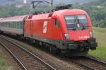 1116 038-9 verlsst mit dem BB-EC 555 Johann Nestroy von Wien Sd-Graz den Bahnhof Gloggnitz in Richtung Semmering. (12.6.2005)