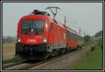 1116 130 mit ihrem EC 154 von Marburg kommend Richtung Graz unterwegs am 25.4.2006 kurz nach Wildon.