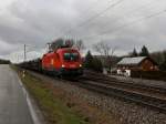Die 1116 030 am 14.01.2012 mit einem Leeren Autozug unterwegs bei Vilshofen.