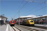  Kapsch  1216 210 mit dem soeben angekommenen IC aus Wien und 1116 275  Max  mit EC 112 nach Frankfurt/Main im bereits teilweise umgebauten, an den Denkmalschutz angepassten Salzburger Hauptbahnhof.