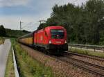 Die 1116 267 mit einem Autozug am 07.06.2012 unterwegs bei Hausbach.