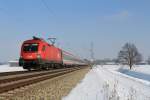 1116 124 mit einem Korridor-Zug auf dem Weg nach Kufstein. Aufgenommen am 26. Januar 2013 bei bersee.