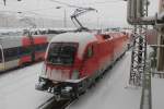 1116-118 im Schneetreiben vor der BB-Traktion in Wien-Westbahnhof.