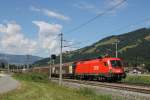 Nachschu von einem Gterzug in die Richtung Wrgl mit die 1116 107 und 1116 053 vorne und hinten die 1116 123-1 bei Brixen im Thale am 31-7-2013.
