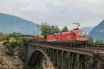 1116 281 und 1144 097 mit einem Mischer am 7. August 2014 auf der Angertalbrücke.