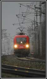 Bild 2: IC 538  WIFI Karriere-Express  von Villach nach Wien am 26.2.2006 bei nicht gerade gutem Fotowetter bei der Durchfahrt in Gloggnitz.