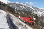 1116 028 und eine 1144 mit Güterzug am 31.01.2015 bei Angertal.