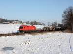Die 1116 078 mit einem Güterzug am 10.02.2013 unterwegs bei Vogl.
