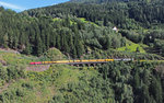 1116 268-4 fährt am 05.09.2016 mit einem Bauzug Talwärts nach Landeck-Zams. Aufnahme Endstand zwischen Strengen und Pians. 