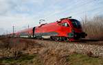 1116 214 (Spirit of Hungary) mit Railjet 63, unterwegs von Mnchen Hbf. nach Budapest Keleti pu. Das Foto enstand kurz vor der ungarischen Grenze in der Nhe von Nickelsdorf im Burgenland am 16.03.2009.