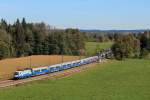 1116 251 und 1116 248 mit ihren Garnituren am 19. Oktober 2014 bei Übersee.