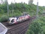 Der  Mozart-Taurus  1116 250-0 bei der Ausfahrt vom
Rangierbahnhof Mnchen Nord am 12.07.2008.