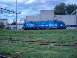 BB Tauris 1116 100 wartet am 10.09.2003 im Bahnhof Buchs St. Gallen auf neue Aufgaben. Die Lok trgt die Werbung fr 30 Jahre Licht ins Dunkel und ist eine Roco Lokomotive.