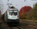 Mein erster Werbeochse: 1116 038-9  Siemens  mit einem leeren Autozug in Dettelbach 31.10.09