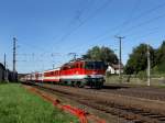 Die 1142 638 mit einem REX nach Linz am 10.09.2011 bei der Ausfahrt aus Schrding.