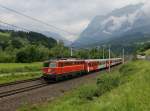 Die 1142 682 mit einem REX nach Salzburg am 21.06.2014 unterwegs bei Pfarrwerfen.