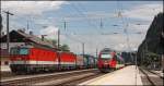 Ein schnes Tandem: 1144 253 (9181 1144 253-2) und eine Schwesterlok bringen einen Kombizug zum Brenner. Aufgrund von Betriebsstrungen zwischen Kundl und Brixlegg konnte am Mittag des 05.07.2008 nur ein Gleis befahren werden. (05.07.2008)
