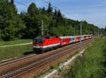 Die 1144 123 mit einem REX nach Linz am 18.05.2012 unterwegs bei Wernstein.