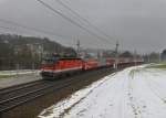 1144 005 mit einem REX nach Linz am 17.02.2013 bei Ingling.