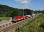 Die 1144 097 mit einem REX nach Linz am 06.07.2014 unterwegs bei Wernstein.